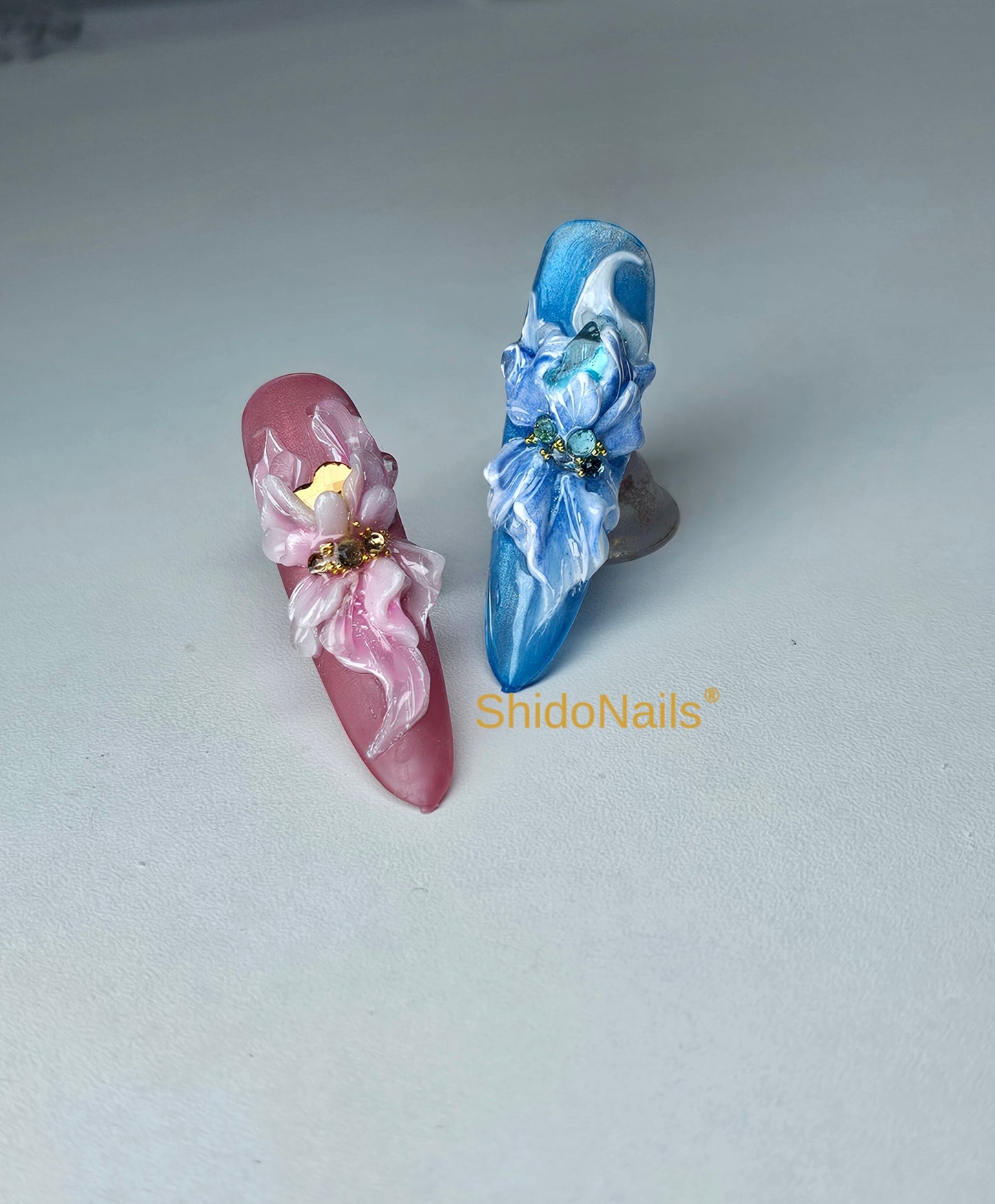 3d nailart nagels vol met 3d bloemen gemaakt met 3d gel