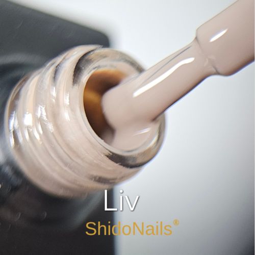 Close-up van de ShidoNails gellak flesopening en het penseel in de kleur Liv, een nude tint.