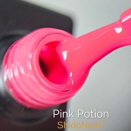 Close-up van de ShidoNails gellak flesopening en het penseel in de kleur pink potion, een felle roze tint.