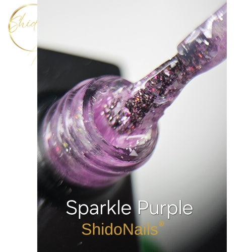 Close-up van lichtpaarse ShidoNails Sparkle Purple gellak met sprankelende glitterflakes.